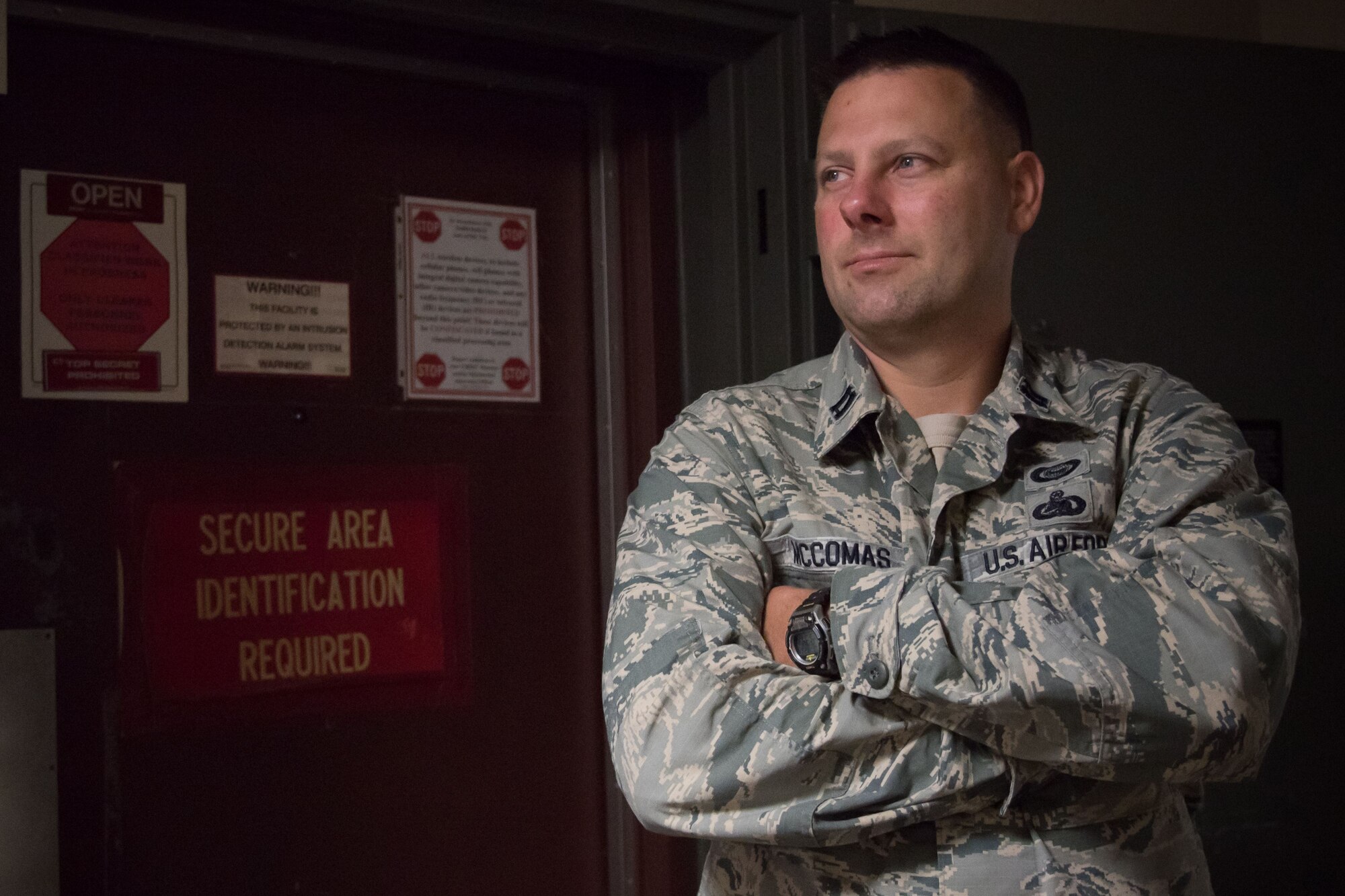 Capt. Paul McComas, 403rd Operations Support Squadron chief of wing intelligence, poses for a photo Aug. 23, 2017 at Keesler Air Force Base Mississippi. He leads a group of intellegence analysts who provide threat briefings before 403rd Wing missions and deployments. (U.S. Air Force photo/Staff Sgt. Heather Heiney)