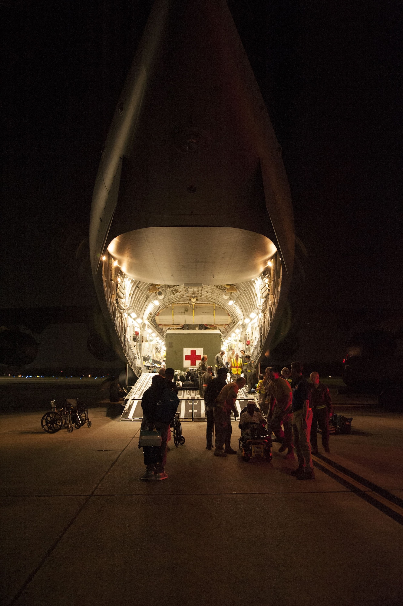 Reserve Citizen Airmen assigned to the 45th Aeromedical Evacuation Squadron, provide medical care to patients being transported from St. Croix, U.S. Virgin Islands, to Dobbins Air Reserve Base, Georgia, Sept. 24, 2017. Within hours after Hurricane Maria impacted the U.S. Virgin Islands, Reserve Citizen Airmen, from MacDill Air Force Base, Florida, were tasked to conduct humanitarian missions. (U.S. Air Force photo by Tech. Sgt. Peter Dean)