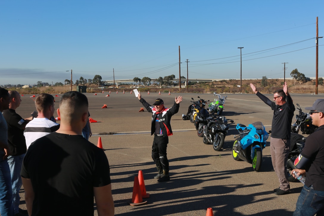 Instructors with the Yamaha Champions Riding School teach a motorcycle safety course to Marines at Marine Corps Air Station Miramar, Calif., Dec. 19. Lead instructor, Nick Ienatsch (center), emphasized “safety over speed” during the advanced safety and skills motorcycle course.  (U.S. Marine Corps photo by Cpl. Victor Mincy/Released)