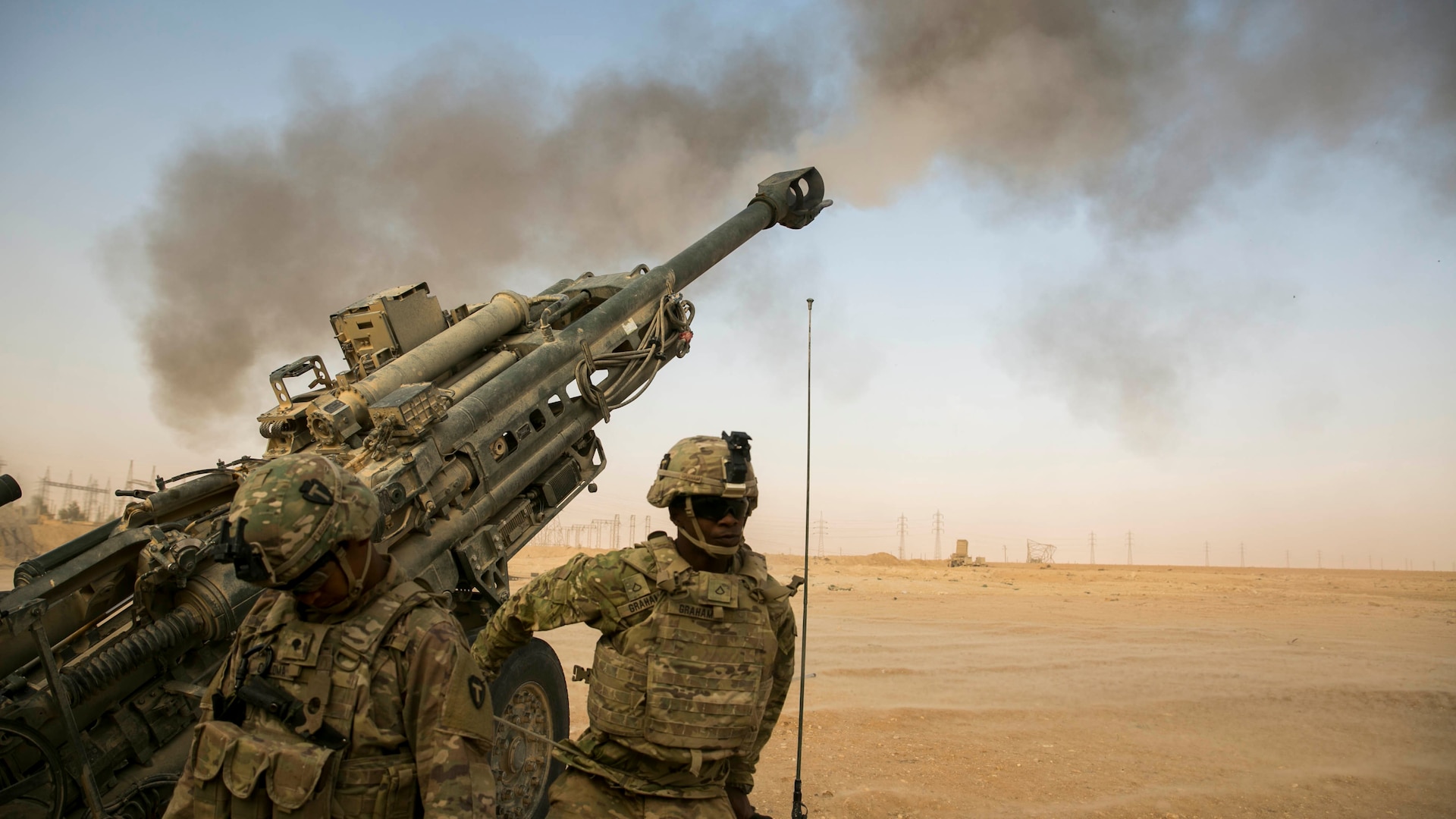 American artillery soldiers respond to a fire mission somewhere in Iraq in support of Combined Joint Task Force Operation Inherent Resolve to provide assistance to their Iraqi partners.