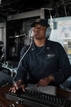 Quartermaster 3rd Class Anastasia Clark, a native of Lake Charles, La., assigned to the amphibious assault ship USS America (LHA 6), stands watch as the detail plotter in the bridge during the ship’s departure from Singapore after a scheduled port visit. America, part of the America Amphibious Ready Group, with embarked 15th Marine Expeditionary Unit, is operating in the Indo-Asia Pacific region to strengthen partnerships and serve as a ready-response force for any type of contingency.