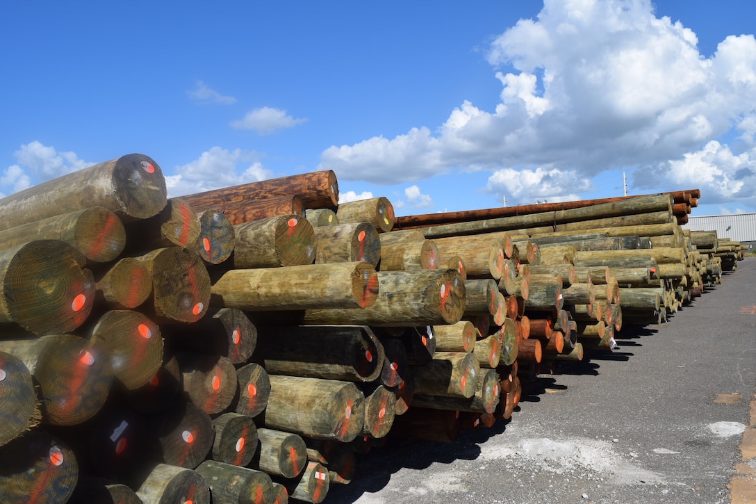 More than 3,000 pressure-treated utility poles, along with hundreds of concrete and steel poles, arrive at the lay-down yard in Ponce, Puerto Rico, part of the tons of critical electrical components flowing in daily from throughout the nation to rebuild the island’s electrical distribution system. The U.S. Army Corps of Engineers’ Task Force Power Restoration team continues to amass an inventory of critical power grid materials for onward delivery to the workforce.