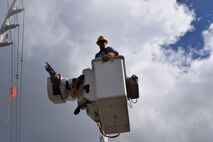 The Army Corps of Engineers Task Force Power Restoration continues their mission through the holidays. Corps Quality Assurance Specialist Amy Tillery observes as a contracted crew from Mas-Tec erect transmission lines Christmas morning. Residences and businesses in the area have been without power for over 100 days. Patrick Foreman, a lineman operating an auger pole truck at the construction site, said he was overwhelmed with the people’s kindness. “My whole crew just wants to finish our work here as safely and quickly as possible, so these fine people can return to a normal life.”