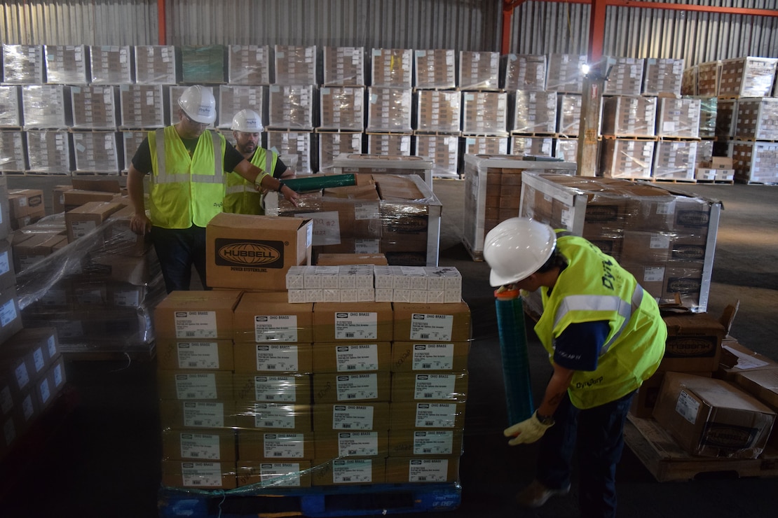 Tons of critical power grid materials arrive daily for housing at the Ponce warehouse, part of the critical electrical components needed to rebuild the island’s power grid. The U.S. Army Corps of Engineers’ Task Force Power Restoration team maintains 100 percent accountability of every item, from the smallest electrical component to the 5,500-pound concrete utility pole, until it arrives at the delivery site, is stored and ultimately issued to the workforce.