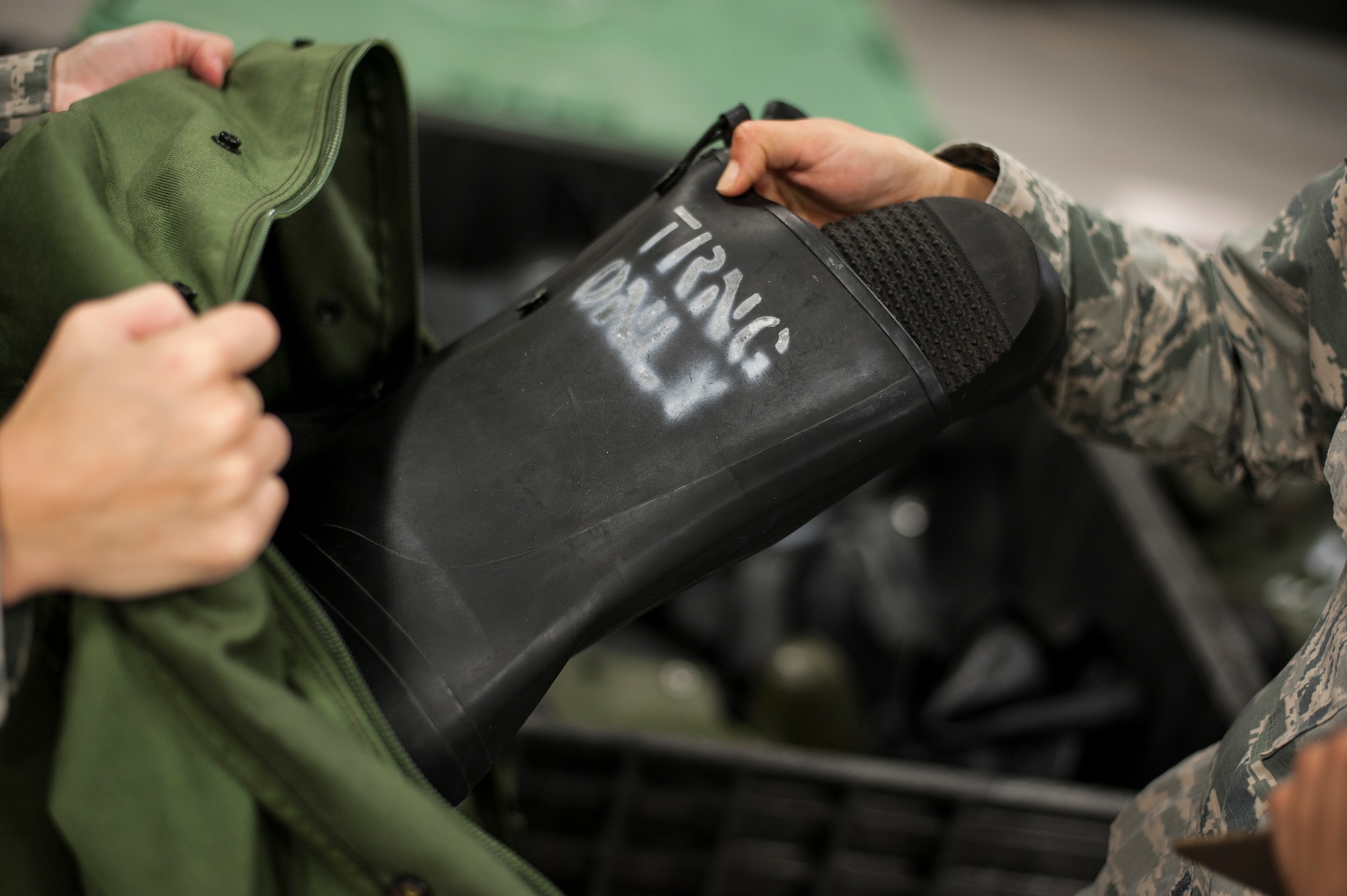 A rubber boot is placed into a duffel bag at MacDill Air Force Base, Fla., Dec. 28, 2017.