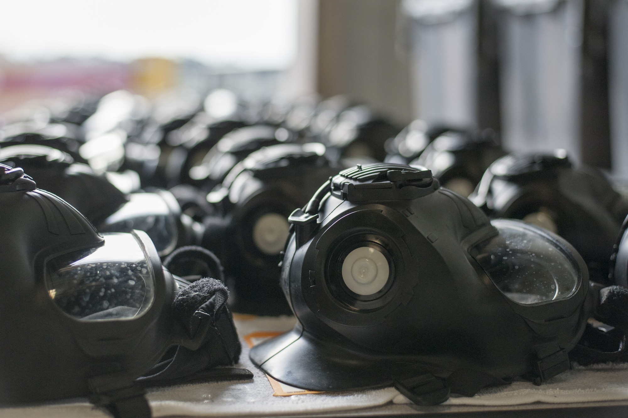 M50 gas masks sit on a table after inspection at MacDill Air Force Base, Fla., Dec. 28, 2017