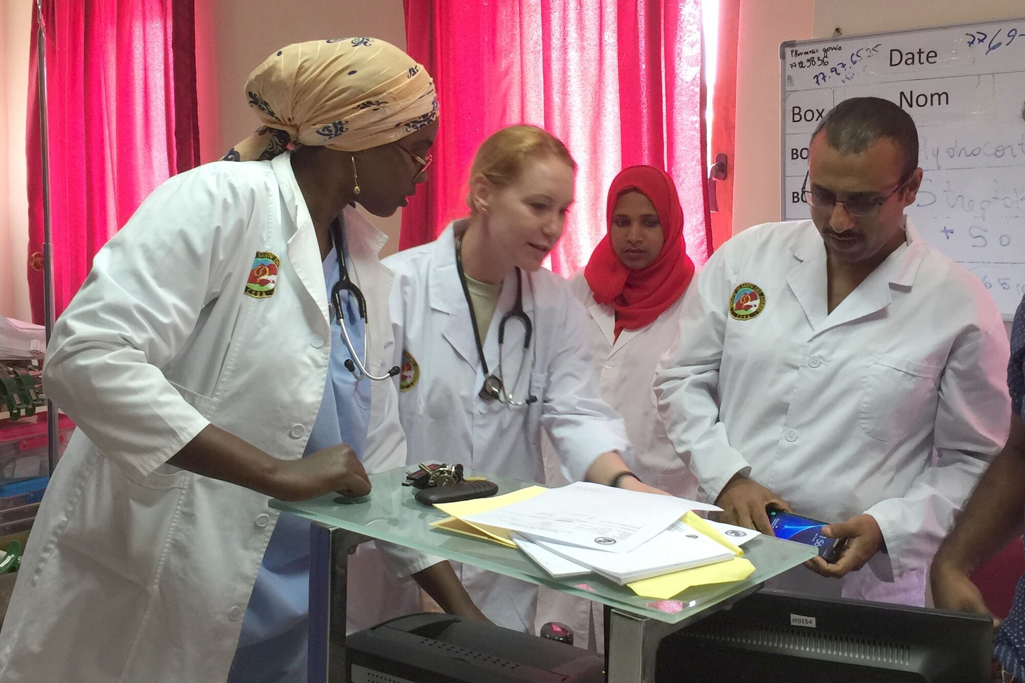 Maj. Brandi Faudree (second from left), a physician assistant with the Kentucky Air National Guard’s 123rd Medical Group in Louisville, Ky., reads electrocardiograms with cardiologists and emergency department physicians at Omar Hassan A. Al Bashir Hospital in Djibouti City, Djibouti, March 11, 2017. Faudree was one of three members of the Kentucky National Guard military medical engagement team that visited the hospital in support of the Kentucky State Partnership Program.