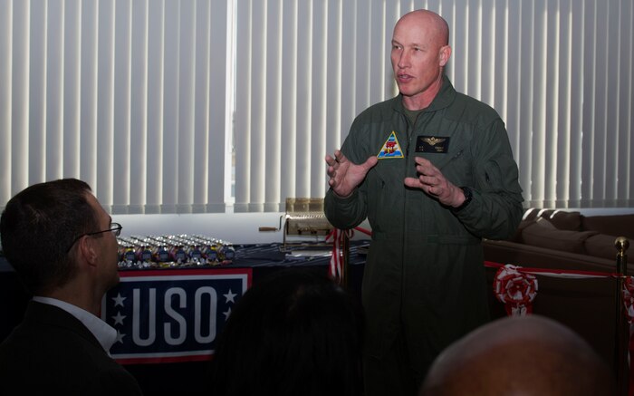 U.S. Marine Corps Col. Richard Fuerst, commanding officer of Marine Corps Air Station Iwakuni, gives his regards to sponsors and guests during the United Service Organization Iwakuni grand opening at MCAS Iwakuni, Japan, Jan. 31, 2017. A ribbon-cutting ceremony was held to signify the official opening. Those who attended toured the facility after the ceremony while enjoying complimentary snacks and refreshments. (U.S. Marine Corps photo by Lance Cpl. Gabriela Garcia-Herrera)