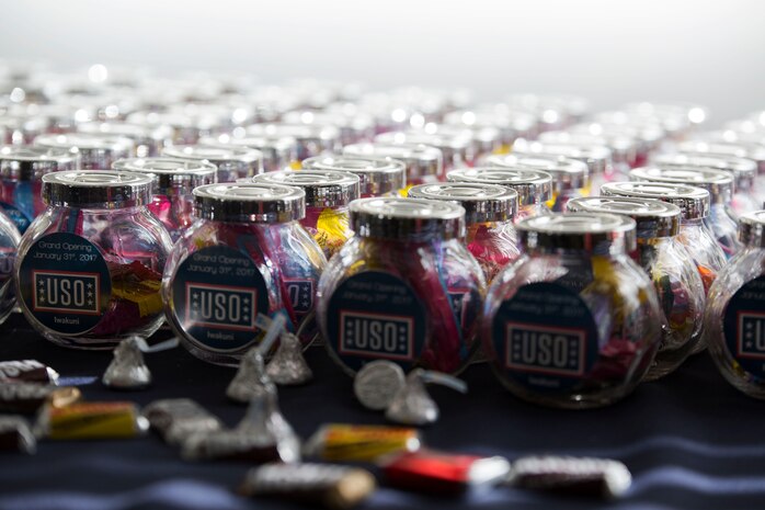 Containers filled with candy line a table during the United Service Organization Iwakuni grand opening at Marine Corps Air Station Iwakuni, Japan, Jan. 31, 2017. A ribbon-cutting ceremony was held to signify the official opening. Sponsors and guests toured the facility after the ceremony while enjoying complimentary snacks and refreshments. (U.S. Marine Corps photo by Lance Cpl. Gabriela Garcia-Herrera)