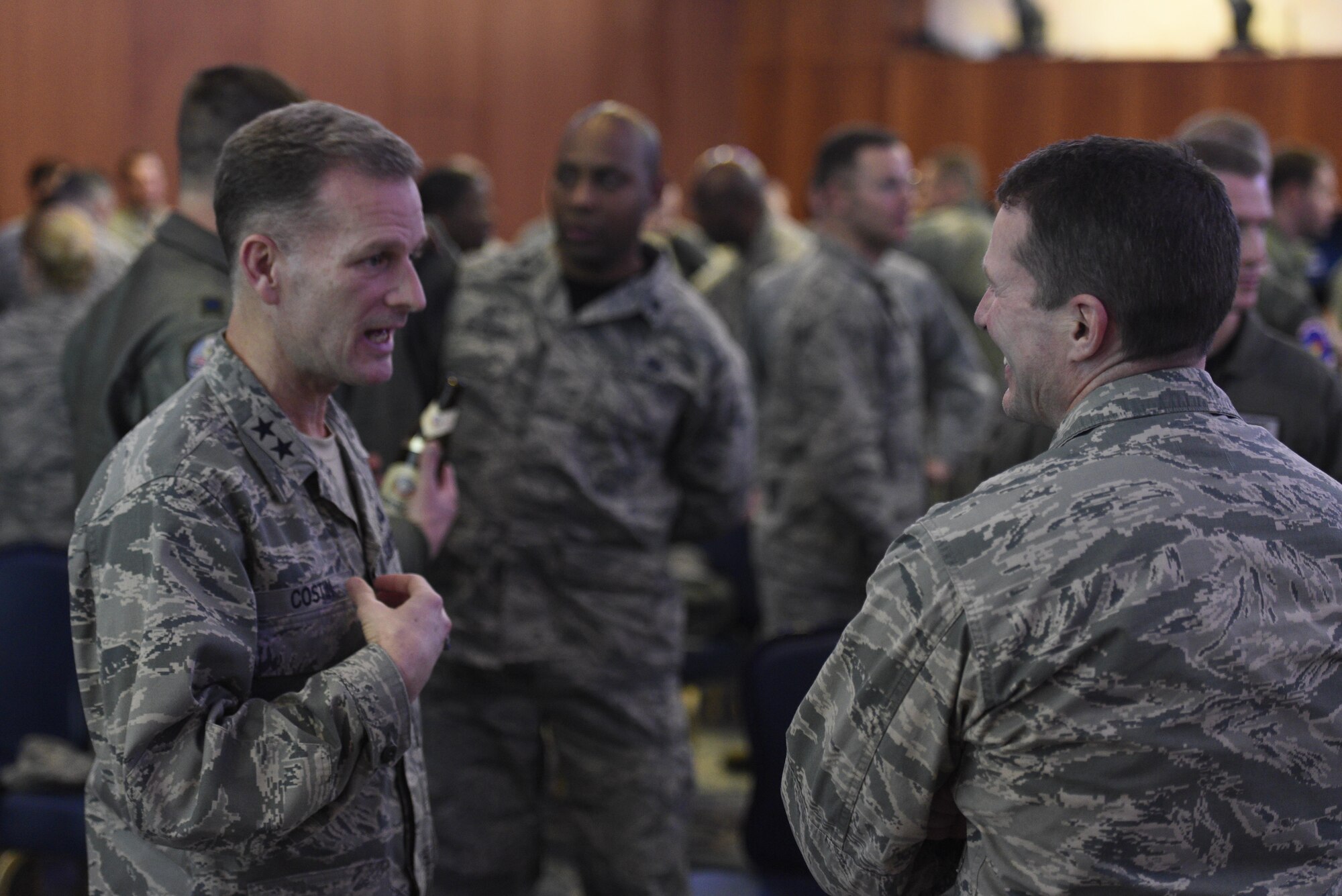 Chap. (Maj. Gen.) Dondi E. Costin, Air Force Chief of Chaplains, talks with Col. Steven Horton, 52nd Fighter Wing vice commander, at Club Eifel on Spangdahlem Air Base, Germany, Jan. 27, 2017. Costin visited here to learn about the challenges faced by Airmen and their families firsthand, while also taking the opportunity to spread his message of resiliency. (U.S. Air Force photo by Staff Sgt. Jonathan Snyder)