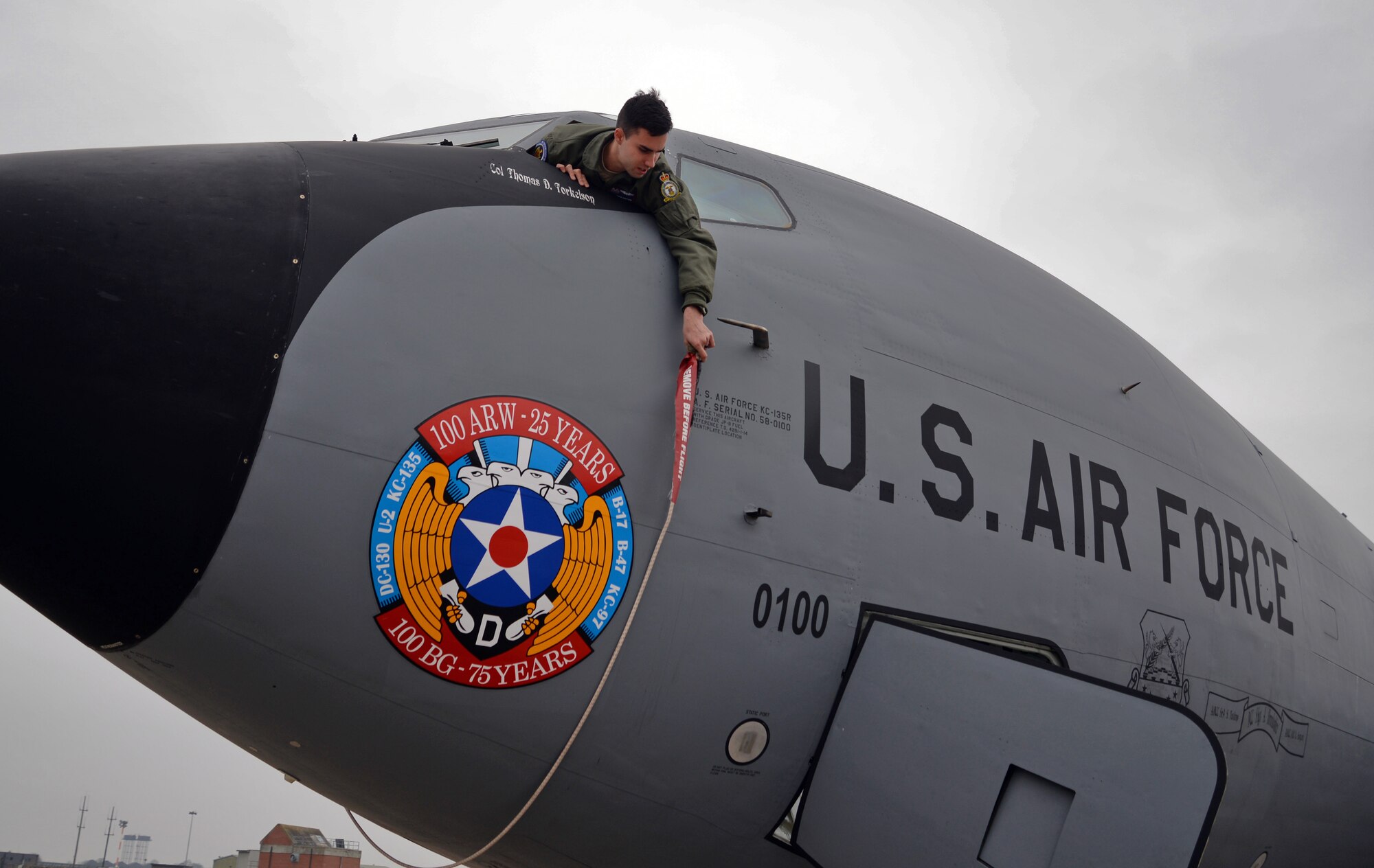 U.S. Air Force Airman 1st Class Steven Rappuhn, 351st Air Refueling Squadron boom operator removes a pitot cover Jan. 31, 2017, on RAF Mildenhall, England. Pitot covers are used to ground and protect the pitot tubes – used as speedometers on aircraft – when the aircraft is not flying. (U.S. Air Force photo by Senior Airman Christine Halan)