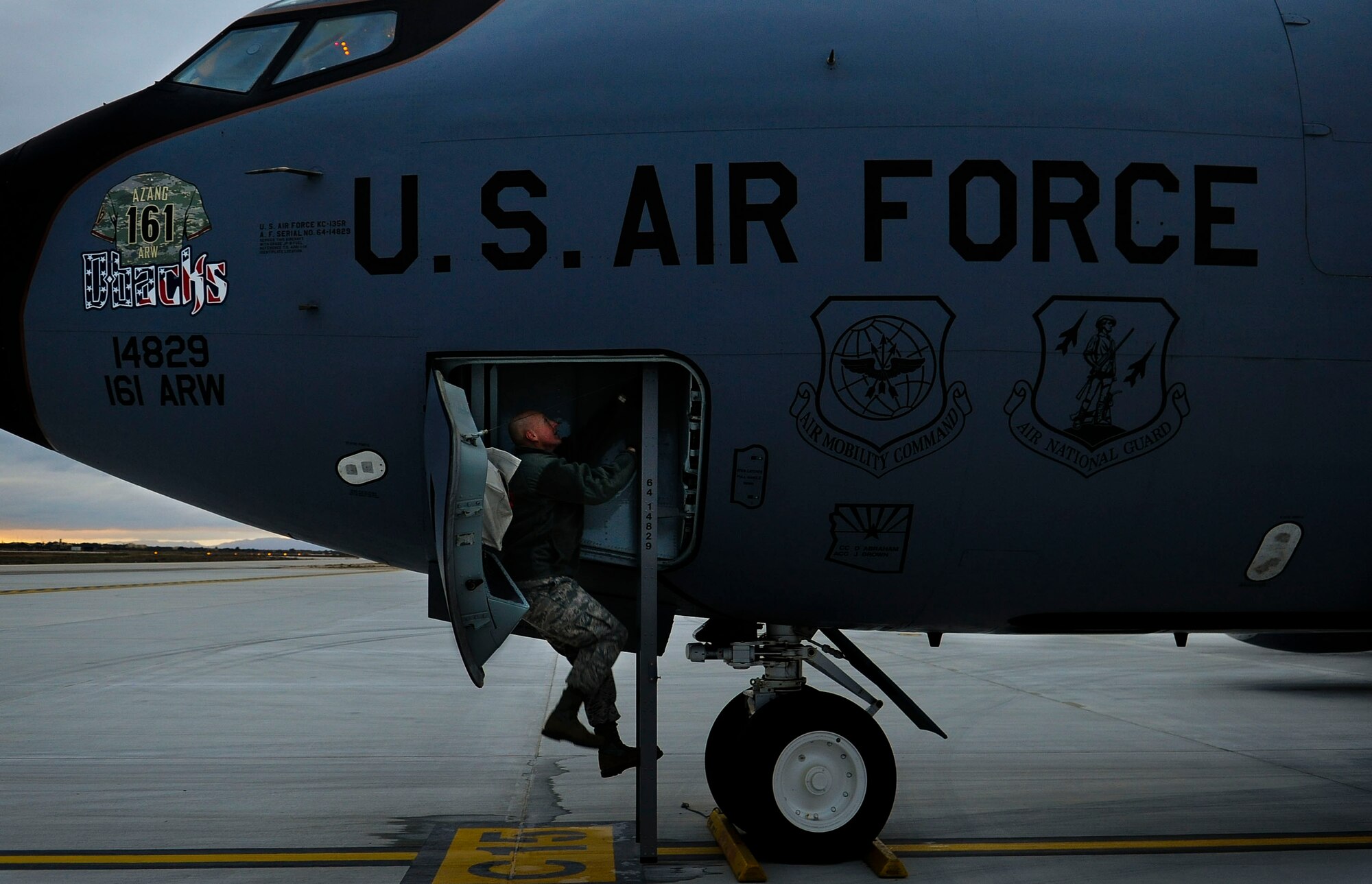 Tech. Sgt. Ken Patrick, 161st Air Refueling Wing avionics technician, boards a KC-135 Stratotanker during a flying training deployment, Jan. 25, 2017, at Souda Bay, Greece. The Arizona Air National Guard’s 161st ARW’s KC-135s performed in-flight refueling operations with F-16 Fighting Falcons from Aviano Air Base, Italy, and the Hellenic air force during the FTD. (U.S. Air Force photo by Staff Sgt. Austin Harvill)