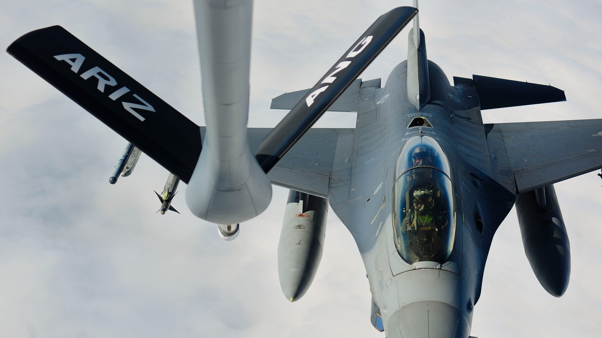 An F-16 Fighting Falcon from the 555th Fighter Squadron, Aviano Air Base, Italy, awaits refueling from a KC-135 Stratotanker, assigned to the Arizona Air National Guard’s 161st Air Refueling Wing, during a flying training deployment, Jan. 27, 2017, at Souda Bay, Greece. The KC-135 refueled U.S. and Hellenic air force F-16s during the FTD, which was hosted to evaluate aircraft and personnel capabilities and increase interoperability between the two NATO allies. (U.S. Air Force photo by Staff Sgt. Austin Harvill)