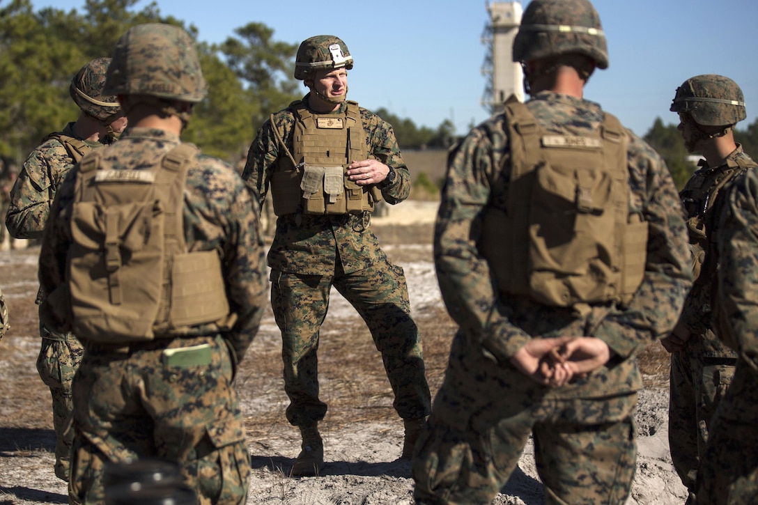 Marine Corps Brig. Gen. Roger Turner, center, commander of Task Force Southwest, talks with Marines during live-fire training at Camp Lejeune, N.C., Jan. 24, 2017. Marine Corps photo by Sgt. Justin T. Updegraff