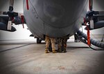 A C-130H maintenance advisor from Train, Advise, Assist Command-Air (TAAC-Air), 440th Air Expeditionary Advisory Squadron, trains an Afghan Air Force C-130 maintainer on the aircraft hydraulics  system at Kabul Air Wing, Afghanistan, Jan. 18, 2017. On Jan. 11, 2017, a group of 44 AAF C-130H maintainers were the first in-country trained to graduate and receive their level three certification.  

The recent graduates were trained by Total Force Airmen who specialize in various maintenance Air Force Specialty Codes from; engine and propulsion, hydraulics, fuel, electrical and environmental, avionics, and crew chief specialist. (U.S. Air Force photo by Tech. Sgt. Veronica Pierce)