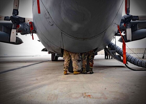 A C-130H maintenance advisor from Train, Advise, Assist Command-Air (TAAC-Air), 440th Air Expeditionary Advisory Squadron, trains an Afghan Air Force C-130 maintainer on the aircraft hydraulics  system at Kabul Air Wing, Afghanistan, Jan. 18, 2017. On Jan. 11, 2017, a group of 44 AAF C-130H maintainers were the first in-country trained to graduate and receive their level three certification.  

The recent graduates were trained by Total Force Airmen who specialize in various maintenance Air Force Specialty Codes from; engine and propulsion, hydraulics, fuel, electrical and environmental, avionics, and crew chief specialist. (U.S. Air Force photo by Tech. Sgt. Veronica Pierce)