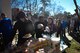 U.S. Airmen assigned to the 20th Fighter Wing wait in line for food after completing dorm clean-up at Shaw Air Force Base, S.C., Jan. 28, 2017. Supervisors and base leadership assisted with the cleaning and helped strengthen bonds with their wingmen. (U.S. Air Force photo by Airman 1st Class Christopher Maldonado)