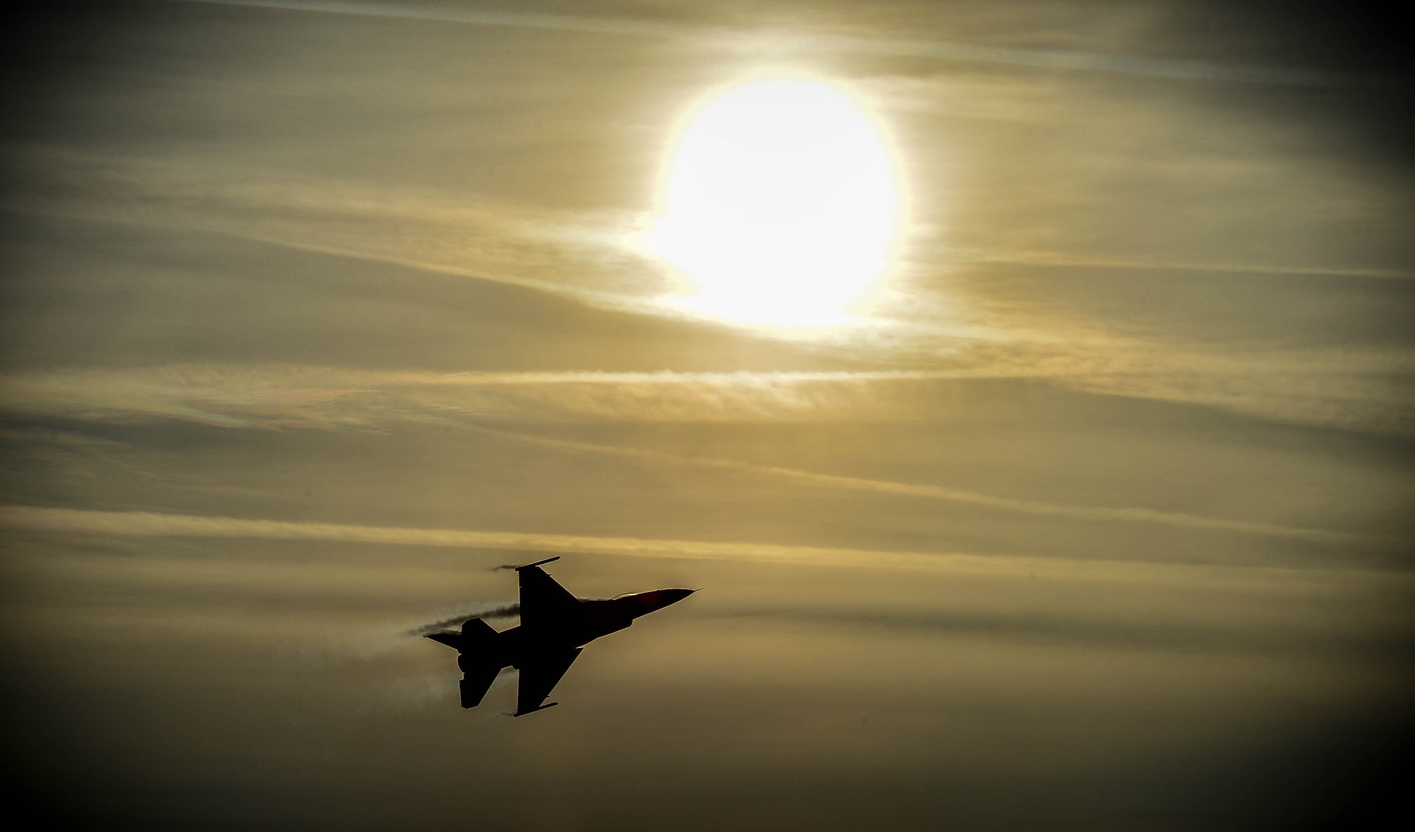 A U.S. Air Force F-16CM Fighting Falcon piloted by Capt. John Waters, F-16 Viper Demonstration team pilot, soars over Shaw Air Force Base, S.C., during a 20th Operations Group certification flight, Jan. 4, 2017. In order to be certified as a demonstration pilot, Waters has to perform and pass four certification flights from the 20th Operations Group commander, 20th Fighter Wing commander, 9th Air Force commander, and Air Combat Command commander. The F-16CM Fighting Falcon was first put into action in 1979 as a multirole fighter capable of suppression of enemy air defenses, offensive counter air, defensive counter air, close air support, and forward air controller missions. (U.S. Air Force photo by Senior Airman Michael Cossaboom)