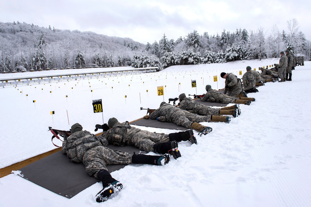Army National Guardsmen fire .22-caliber biathlon rifles during marksmanship training at the Camp Ethan Allen Training Site, Jericho, Vt., Jan. 25, 2017. The soldiers are assigned to the Vermont Army National Guard’s Company A, 3rd Battalion, 172nd Infantry Regiment, 86th Infantry Brigade Combat Team (Mountain), and Colorado Army National Guard’s Charlie Company C, 1st Battalion, 157th Infantry Regiment, 86th Infantry Brigade Combat Team (Mountain). The training featured squads skiing, shooting and communicating together in mountainous terrain. Air National Guard photo by Tech. Sgt. Sarah Mattison