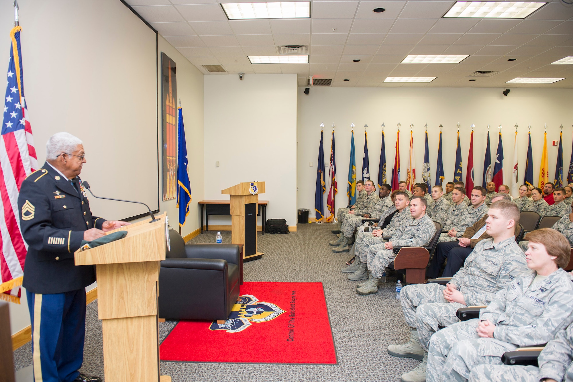 Medal of Honor recipient retired U.S. Army Sgt. 1st Class Melvin Morris speaks to members of Patrick Air Force Base, Fla. Jan. 31, 2017. Morris emphasized the importance of pushing through adversity because we are trained and trusted to always get the job done regardless of our circumstances. (U.S. Air Force photo by Phil Sunkel)