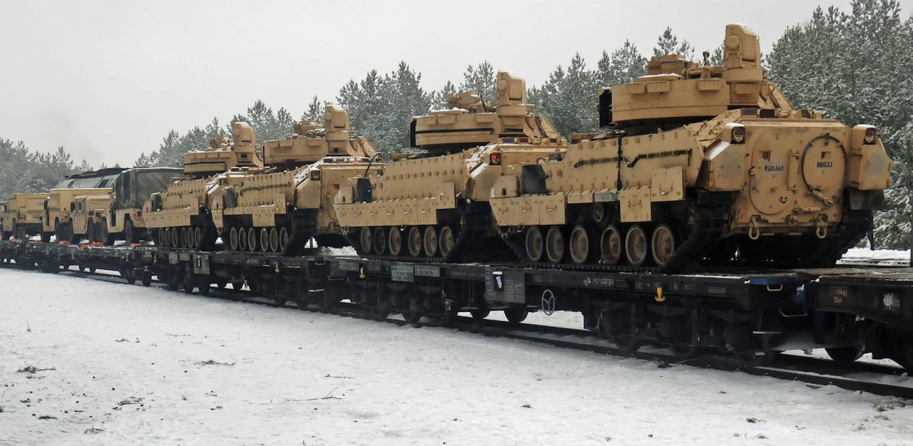 M1A2 Abrams tanks loaded onto railcars in Trzbien, Poland, wait to be transported to Estonia, Jan. 31, 2017. The tanks are assigned the 4th Infantry Division’s Charlie Company, 1st Battalion, 68th Armored Regiment, 3rd Armored Brigade Combat Team, which is starting a rotation to Estonia in support of Operation Atlantic Resolve. Army photo by Staff Sgt. Corinna Baltos