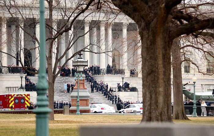 Participants in the 58th Presidential Inauguration, including President Donald Trump, Vice-President Mike Pence and military assets assigned to Joint Task Force National Capitol Region, JTF-NCR, watch as former President Barack Obama departs aboard Marine One, Jan. 20, 2017. Initial Response Force A, Chemical Biological Incident Response Force, assumed the ready position working under JTF-NCR which provided military support to the lead agency the U.S. Secret Service during the 58th Presidential Inauguration in Washington D.C., Jan. 20, 2017. The Inauguration was designated a National Special Security Event, NSSE, by the Secretary of the Department of Homeland Security on July 2016. When an event is designated an NSSE, the U.S. Secret Service assumes its mandated role as the lead federal agency for the design and implementation of the operational security plan. Although elements of CBIRF were staged near the U.S. Capitol building, other elements of CBIRF were on standby at CBIRF headquarters, making the Inauguration supported by the entire CBIRF unit. (Official USMC Photos by Staff Sgt. Santiago G. Colon Jr./RELEASED)
