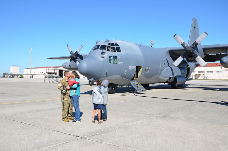 A group of fixed and rotor wing aviator, maintenance and support personnel deployed to Africa and Afghanistan. In both locations, Rescue Wing Airmen are tasked with saving lives by using their skills and equipment to perform combat rescue operations – speeding to pick up isolated personnel and the injured and return them safely. (U.S. Air Force photo/Maj. Cathleen Snow)