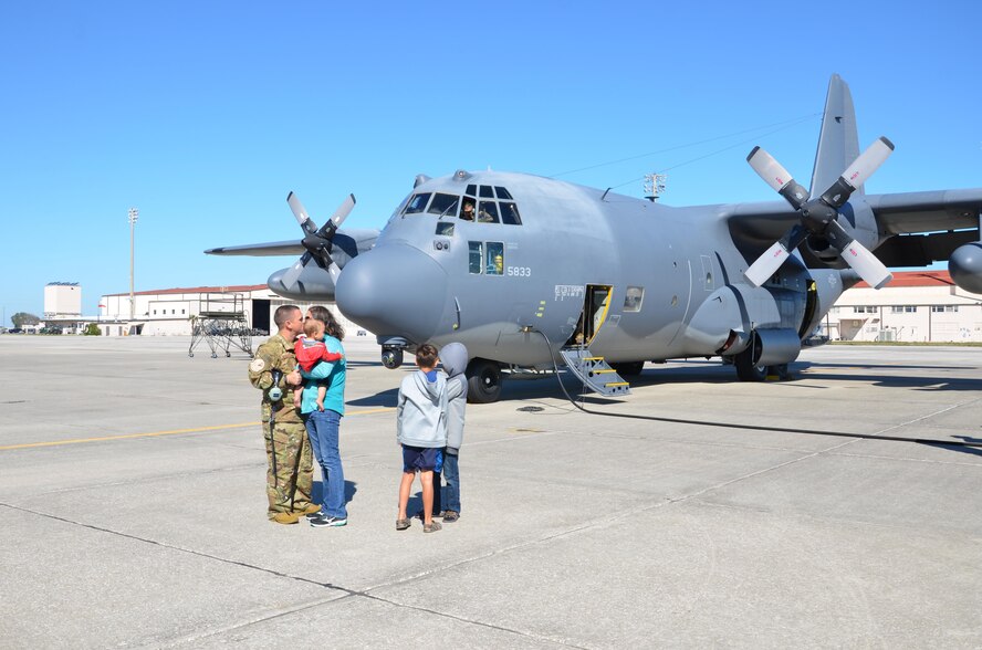 A group of fixed and rotor wing aviator, maintenance and support personnel deployed to Africa and Afghanistan. In both locations, Rescue Wing Airmen are tasked with saving lives by using their skills and equipment to perform combat rescue operations – speeding to pick up isolated personnel and the injured and return them safely. (U.S. Air Force photo/Maj. Cathleen Snow)