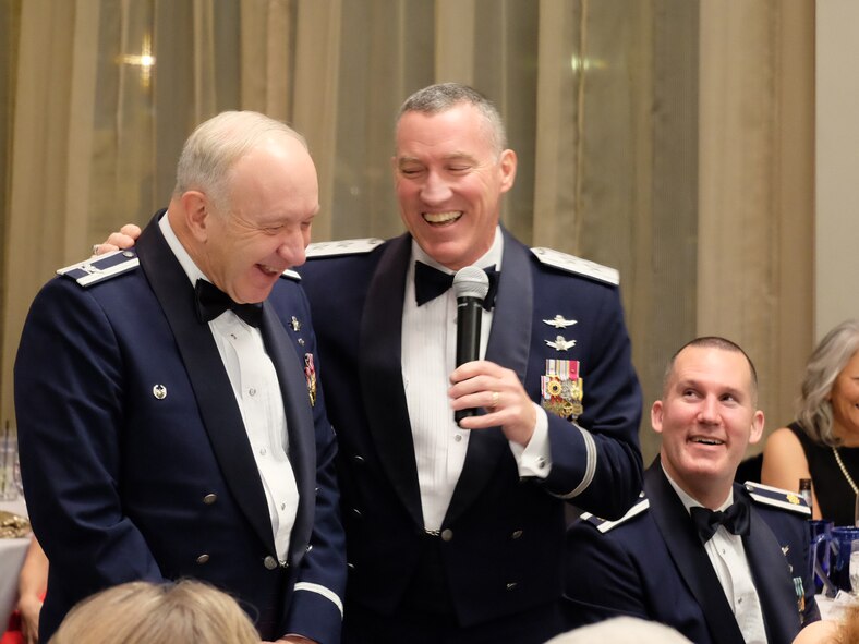 Retired Col. Jack Anthony, 1st Space Operations Squadron commander from July 1996 – July 1998, laughs with Maj. Gen. Burke E. Wilson, Deputy Principal Cyber Advisor to the Secretary of Defense and Senior Military Advisor for Cyber, Office of the Under Secretary of Defense for Policy, Office of the Secretary of Defense, the Pentagon, Washington, D.C. during the squadron’s 25th anniversary celebration at The Mining Exchange, in Colorado Springs, Colorado, Friday, Jan. 27, 2017. Wilson was the 1 SOPS commander from July 2002 – July 2003. The former commanders recalled their prior service together as “Captain Wilson” and “Major Anthony.” (U.S. Air Force photo/Senior Airman Brandon Files)