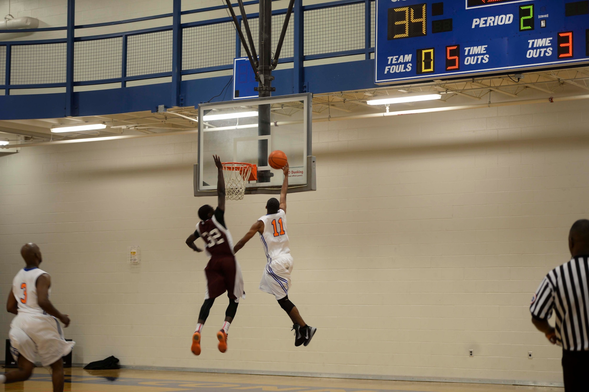 Lt. Ramoane Jordan, McConnell Tornadoes basketball player, executes a lay-up during a game against the Tinker Hawks, Oct. 17, 2015, at McConnell Air Force Base, Kan. The team represents the base by duking it out against 15 other Air Force and Army installation basketball teams from Texas, Louisiana, Oklahoma, Colorado, New Mexico and Missouri. (U.S. Air Force photo/Senior Airman Colby L. Hardin)