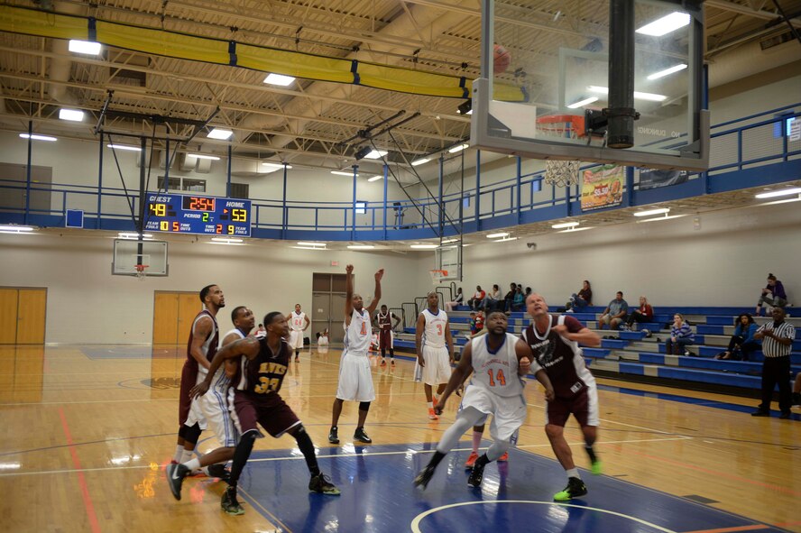 Lt. Ramoane Jordan, McConnell Tornadoes basketball player, shoots a free throw during a game against the Tinker Hawks, Oct. 17, 2015, at McConnell Air Force Base, Kan. Several of the teammates have spent the last two to three years on the team. (U.S. Air Force photo/Senior Airman Colby L. Hardin)