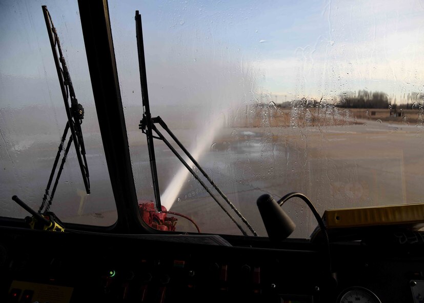 Airman 1st Class Josh Henson, 22nd Civil Engineer Squadron firefighter, performs an operations check on one of the fire department’s emergency vehicles, Feb. 1, 2017, at McConnell Air Force Base, Kan. Daily inspections are done on each vehicle to ensure mission preparedness. (U.S. Air Force photos/Airman 1st Class Erin McClellan)