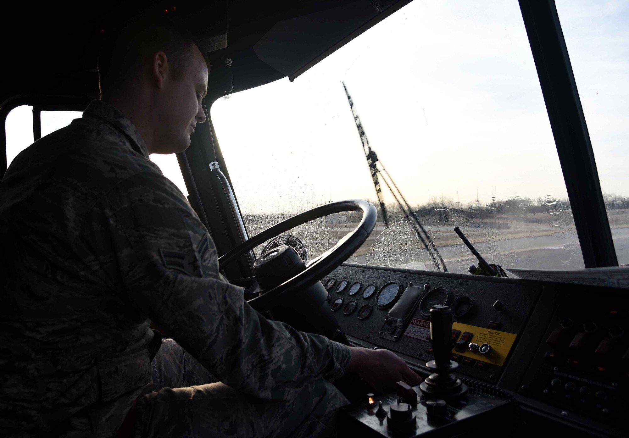Airman 1st Class Josh Henson, 22nd Civil Engineer Squadron firefighter, performs an operations check on one of the fire department’s emergency vehicles, Feb. 1, 2017, at McConnell Air Force Base, Kan. Daily inspections are done on each vehicle to ensure mission preparedness. (U.S. Air Force photos/Airman 1st Class Erin McClellan)