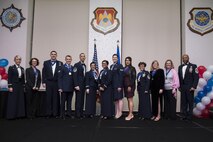 Pictured are the 375th Air Mobility Wing annual award winners with Col. Laura Lenderman, 375th Air Mobility Wing commander, and Chief Master Sgt. Wesley Mathias, 375th AMW command chief. (U.S. Air Force photo by Airman 1st Class Melissa Estevez)