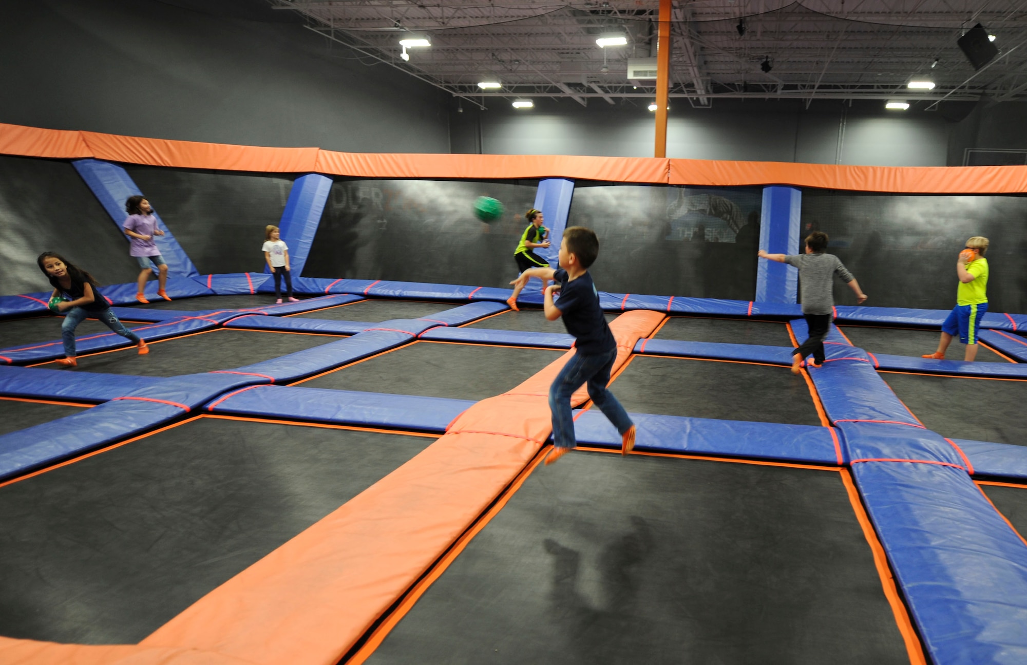 Families of deployed Air Commandos enjoy a Hearts Apart event at the Sky Zone in Pensacola, Fla., Jan. 28, 2017. Hearts Apart is an Airman and Family Readiness Center program for spouses of deployed Air Commandos to connect with other spouses and form support networks. (U.S. Air Force photo by Senior Airman Kasie P. Whitfield)