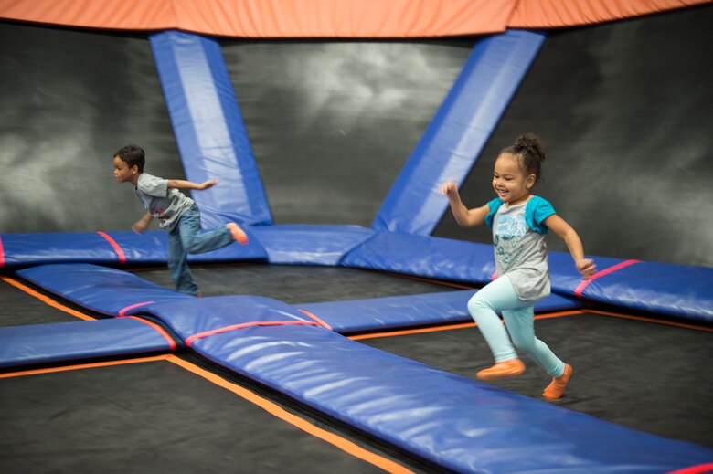 Aliyna and Kamron Rochester, children of Staff Sgt. Patrick Rochester, a weapons load crew chief with the 1st Special Operations Maintenance Squadron, enjoy a Hearts Apart event at the Sky Zone in Pensacola, Fla., Jan. 28, 2017. The Hurlburt Airman and Family Readiness Center organizes events monthly for families of deployed Air Commandos. (U.S. Air Force photo by Senior Airman Krystal M. Garrett)
