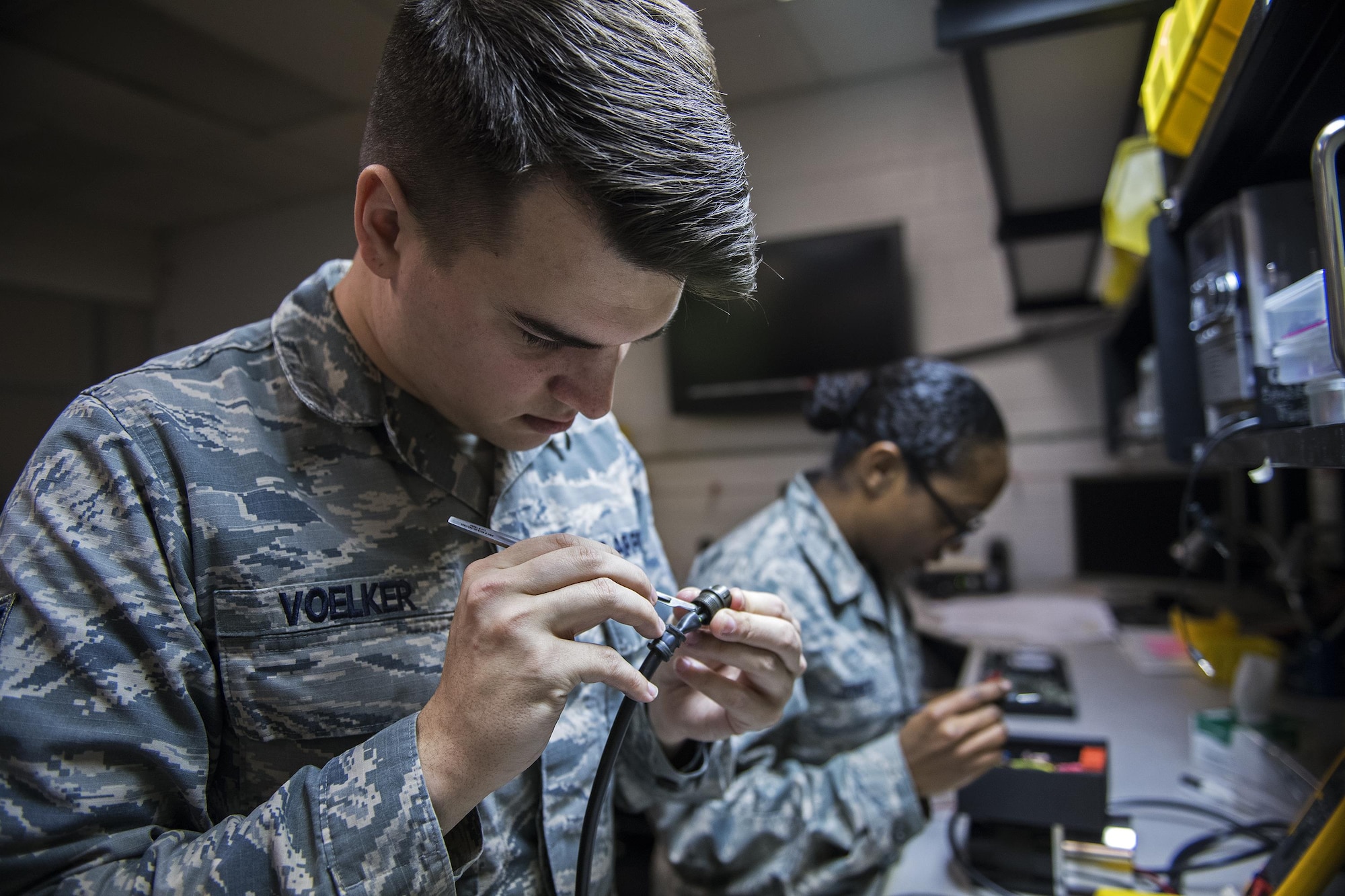 Staff Sgt. Cody Voelker, 23d Maintenance Group Air Force Repair Enhancement Program Technician, removes wires from a plug, Jan. 30, 2017, at Moody Air Force Base, Ga. Moody’s AFREP technicians have an over 90 percent success rate when it comes to fixing parts. (U.S. Air Force photo by Airman 1st Class Janiqua P. Robinson)