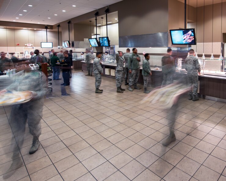 Patrons gather for lunch at the Sierra Inn Dining Facility at Travis Air Force Base, Calif., Jan. 25, 2017. The dining facility was named Air Mobility Command's best and will now compete at the Air Force level for the John L. Hennessy Trophy, which recognizes excellence in food service. (U.S. Air Force photo/Louis Briscese)