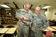 Sgt. 1st Class Dunny Bailey and Master Sgt. Jack O’Brien, both instructors supporting the 13th Battalion, 100th Regiment at Fort McCoy, check teaching material while completing a program-of-instruction review Oct. 26 of the 89B Ammunition Specialist Course taught by the battalion. During fiscal year 2017, the battalion will see an increase in number of students training at Fort McCoy as the unit adds an Advanced Leadership Course, Senior Leadership Course, and other courses to its curriculum. 