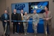Lt. Gen. Steven Kwast, Commander and President of Air University, and Air University Command Chief, Chief Master Sgt. Juliet Gudgel officially open AU’s Teaching and Learning Center and the re-opening of Air Univeristy Press Jan. 27, 2017, at Maxwell Air Force Base, Ala. The center is a place where people can come together and explore new technologies, share ideas, and experiment with techniques and apply them in ways that are meaningful to AU. Accompanying Kwast and Gudgel, from left to right, are Dr. Shane Duncanson, TLC Writing Lab Specialist, Dr. Dale Hayden, Air University Press Director, Dr. Anthony Gould, TLC Director and Mr. Douglas McCarty, TLC Instructional System Specialist. (US Air Force photo/Bud Hancock)