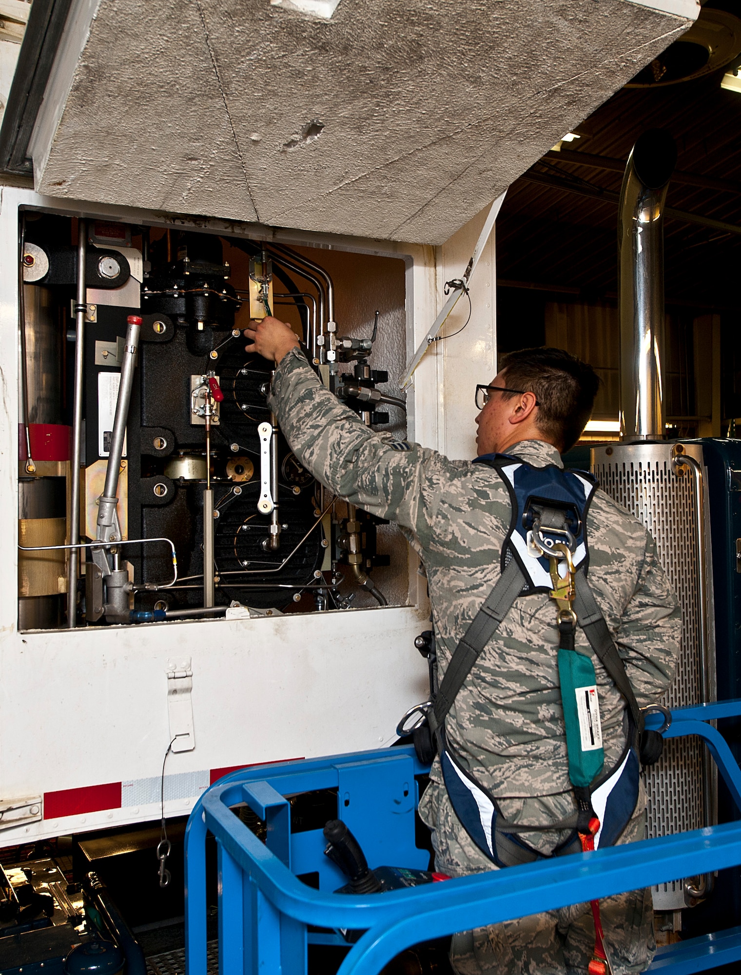 Senior Airman Jesse Casper, 91st Missile Maintenance Squadron missile handling team technician, inspects a hoist control box at Minot Air Force Base, N.D., Jan. 19, 2017. The MHT oversees the shipping and receiving of nuclear capable Minuteman missiles and is responsible for transporting them to-and-from a launch facility. (U.S. Air Force photo/Airman 1st Class Jonathan McElderry)