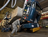 Airmen with the 91st Missile Maintenance Squadron missile handling team check the serviceability of a transporter erector at Minot Air Force Base, N.D., Jan. 19, 2017. When the MHT is at a launch facility, they are directly involved in the installation or removal of the missile's rocket fuel booster stages. (U.S. Air Force photo/Airman 1st Class Jonathan McElderry)