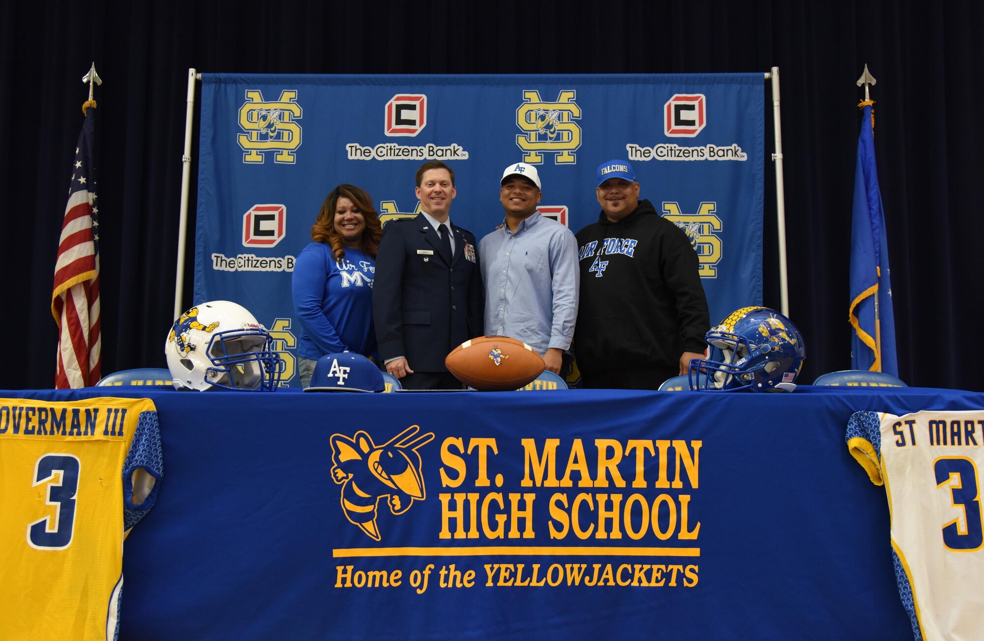Col. C. Mike Smith (second from the left), 81st Training Wing vice commander, poses for a photo with Wayne Overman III (third from the left), St. Martin High School senior and quarterback, and his parents, Angel (far left) and Wayne Overman II (far right), during the school’s 2017 National Signing Day Feb. 1, 2017, at St. Martin, Miss. Overman signed a letter of intent to attend the Air Force Academy and play football for the Air Force Falcons. (U.S. Air Force photo by Kemberly Groue)