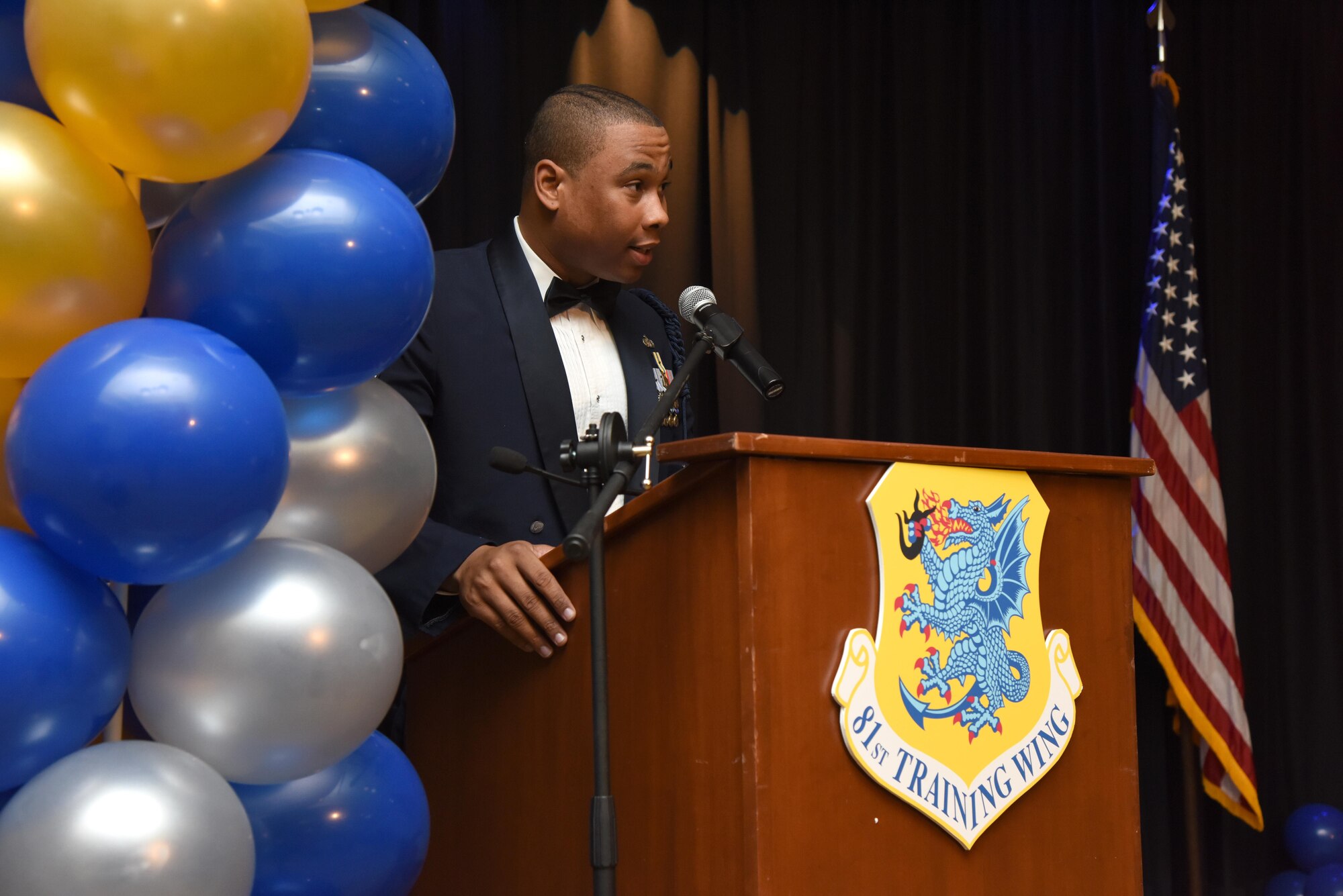 Tech. Sgt. Jonathan McElroy, 338th Training Squadron military training leader, welcomes Keesler personnel to the 2016 Keesler Annual Awards Ceremony at the Bay Breeze Event Center Jan. 31, 2017, on Keesler Air Force Base, Miss. During the ceremony base leadership recognized outstanding Airmen and civilians from across the installation for their accomplishments throughout 2016. (U.S. Air Force photo by Kemberly Groue)
