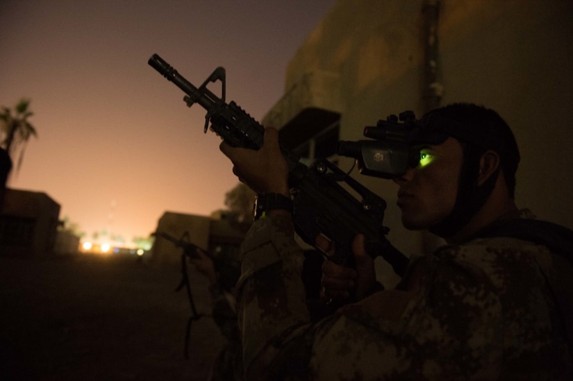 An Iraqi Counter-Terrorism Service soldier peers through night-vision goggles during an urban operation night exercise near Baghdad, Nov. 5, 2016. The CTS is Iraq’s elite counter-terrorism force and has proven to be an effective fighting force against ISIL. Army photo by Staff Sgt. Alex Manne