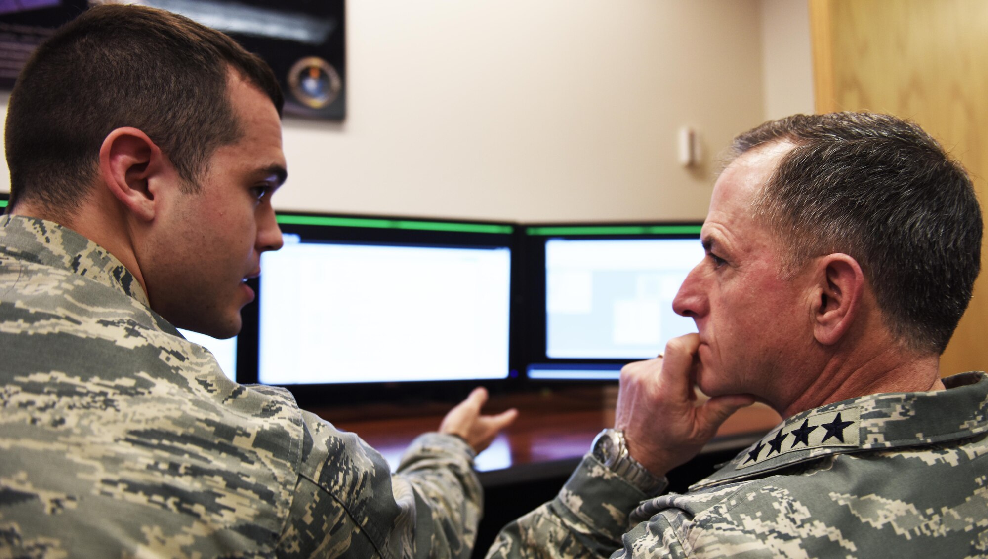 2nd Lt. Daniel Johansen, 381st Training Group student, demonstrates a portion of space systems training to Gen. David L. Goldfein, Air Force Chief of Staff, Jan. 30, 2017, Vandenberg Air Force Base, Calif. (U.S. Air Force photo by Senior Airman Ian Dudley/Released)