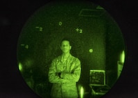 Tech. Sgt. Adam W. Bethea, 374th Operations Support Squadron Aircrew Flight Equipment Flight assistant NCO in charge AFE main shop, poses for a photo in a night vision goggle maintenance room Jan. 20, 2017 at Yokota Air Base, Japan. The AFE flight maintains various pieces of aircrew enhancement equipment such as night vision goggles. (U.S. Air Force photo by Airman 1st Class Donald Hudson)