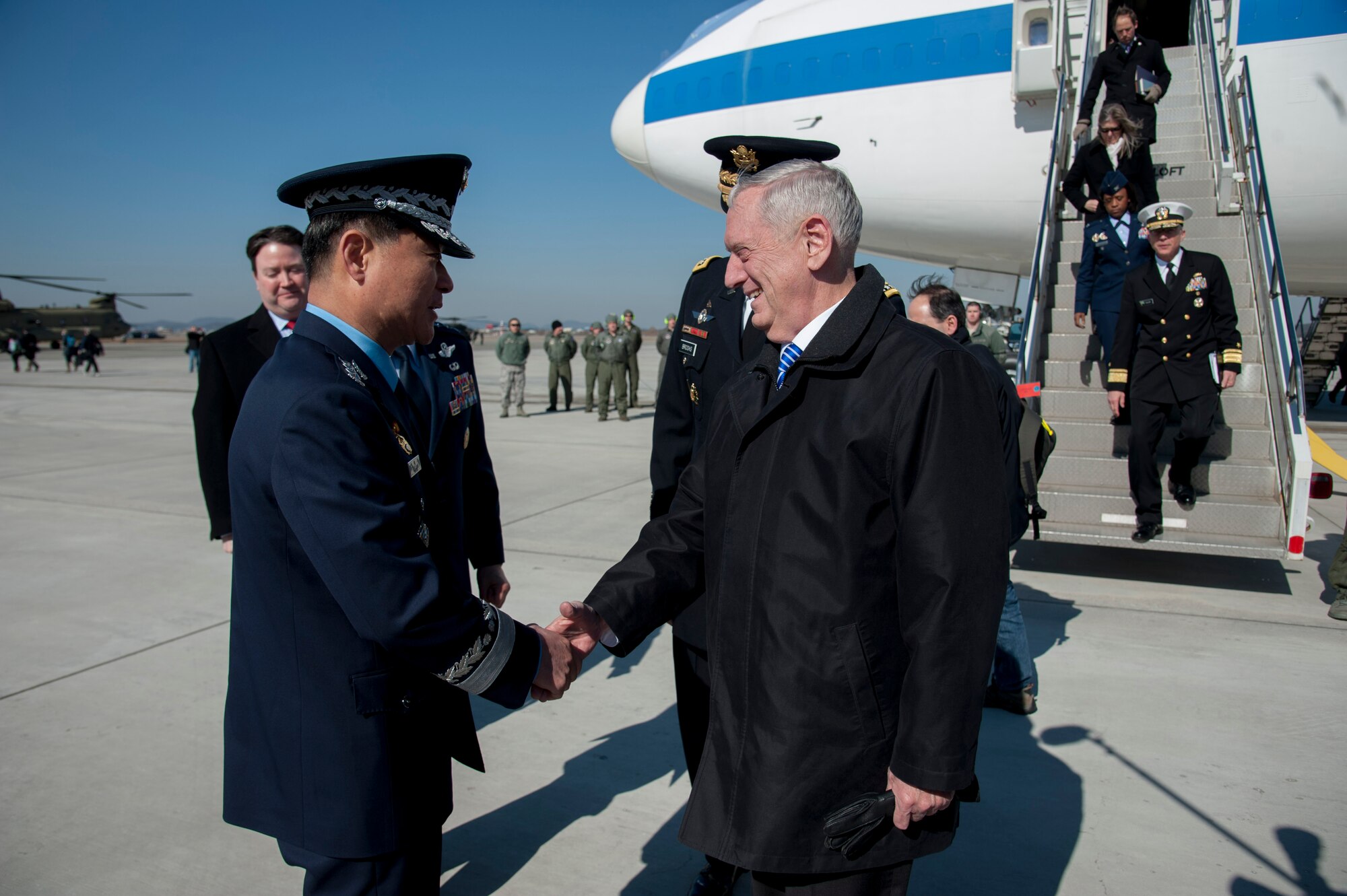 Defense Secretary Jim Mattis greets ROK air force Lt. Gen. Won, In-Choul, ROKAF Operations Command commander, as he arrives at Osan Air Base, Republic of Korea, Feb. 2, 2017. Mattis’ visit to the ROK, the first such visit in his tenure as secretary of defense, comes in light of a year of strong provocations from North Korea, affirming the ironclad commitment the U.S. has in strengthening its robust alliance with the ROK. (U.S. Air Force photo by Staff Sgt. Jonathan Steffen)