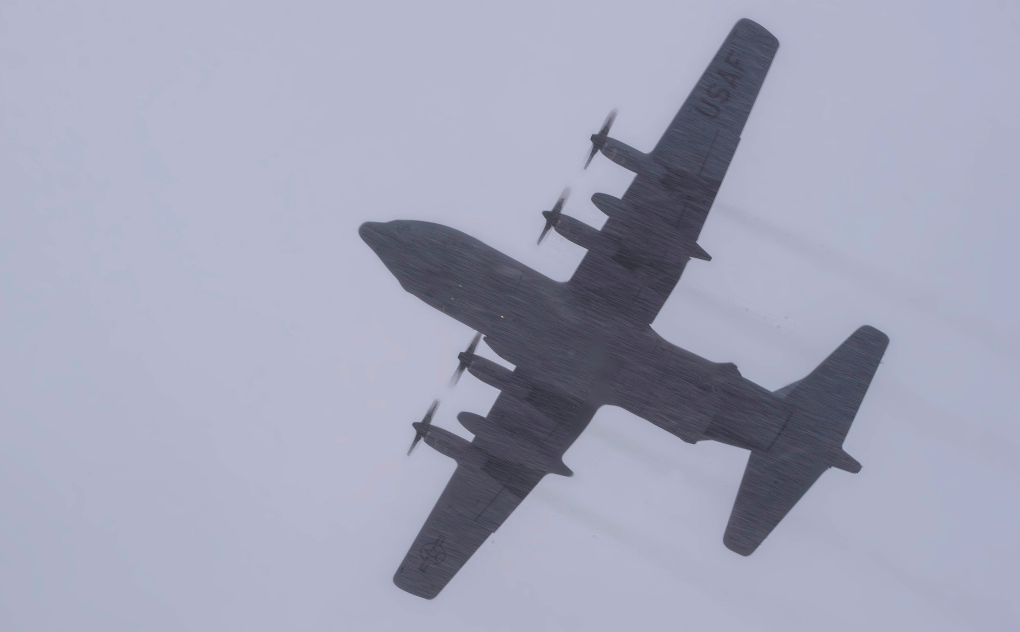 A C-130 Hercules assigned to the 36th Airlift Squadron, Yokota Air Base, Japan, flies over Draughon Range near Misawa Air Base, Japan, Jan. 31, 2017. Airmen from Yokota Air Base visited Misawa to practice their instrument meteorological condition skills, which are used when low or poor weather conditions exist. (U.S. Air Force photo by Tech. Sgt. Araceli Alarcon)
