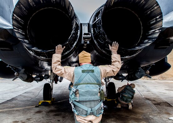 U. S. Air Force Col. David Brynteson, 332nd Expeditionary Operations Group commander, checks the engines on an F-15E Strike Eagle Jan. 27, 2017, in Southwest Asia. Brynteson was preparing to fly his last sortie in theater. (U.S. Air Force photo by Staff Sgt. Eboni Reams)